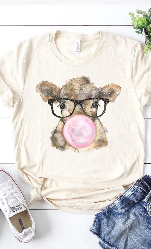 Front view of women’s plus size cow graphic tee with glasses and bubble gum print.