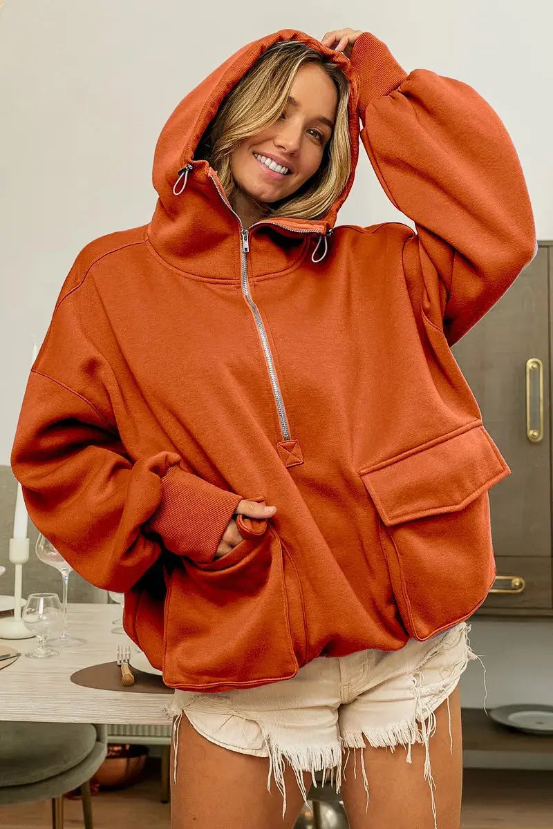 Front view of BiBi half zip vintage washed fleece hoodie in oversized fit.