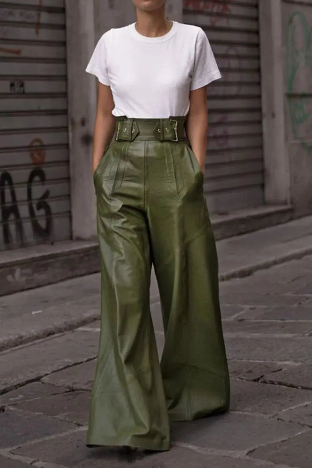 Full-body view of green wide leg pants paired with heels and crop top.