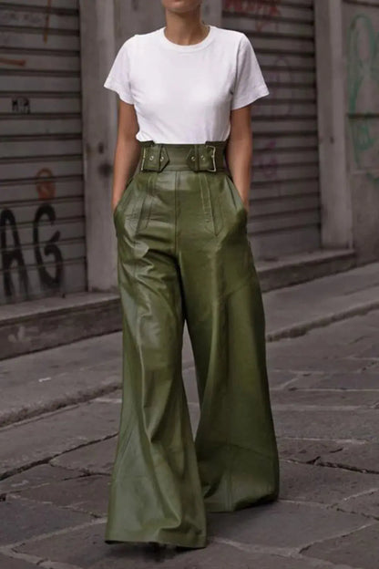 Full-body view of green wide leg pants paired with heels and crop top.