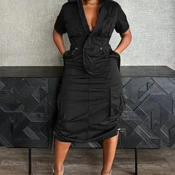 Black utility pocket shirt dress with adjustable waist – front view.