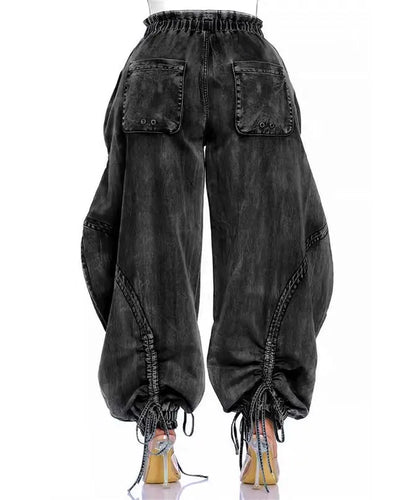 Black denim baggy pants on a white background