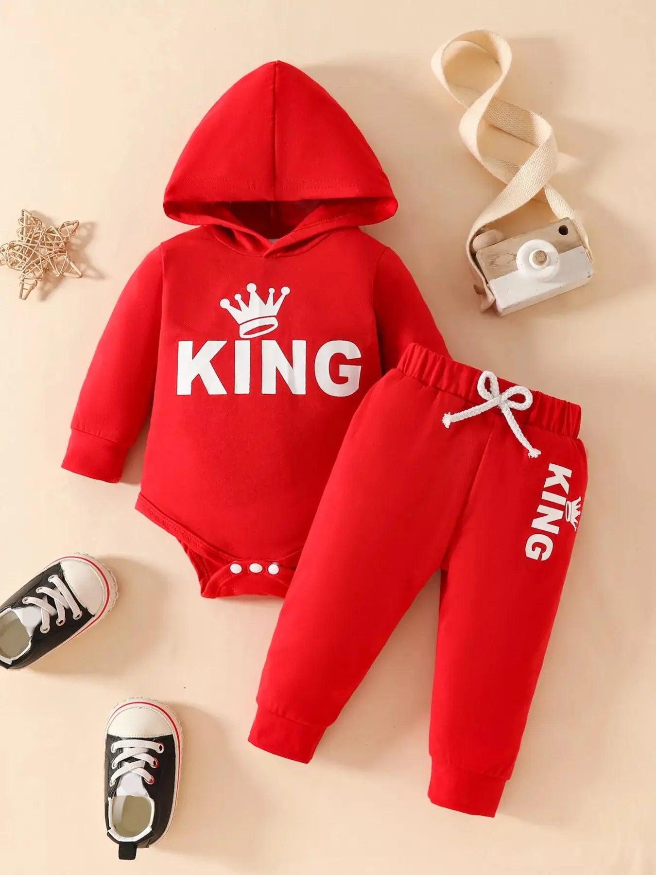 Red toddler hoodie and pants outfit with white KING lettering and crown design.