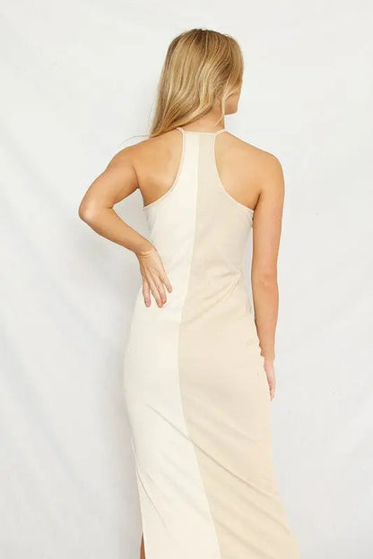 Color block halter dress for women featuring a rib knit fabric, side slit, and modern halter neckline - back view on female model.