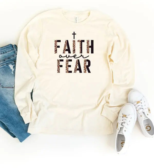 Flat lay of Faith Over Fear inspirational graphic tee paired with casual fall outfit.