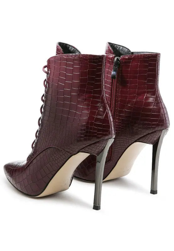 Side and back view of burgundy croc lace-up stiletto boot with zipper closure.