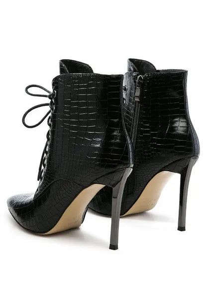Side view of black croc lace-up stiletto boot with zipper closure.