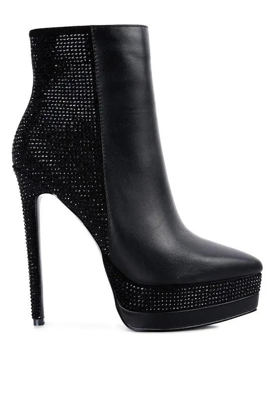 Side profile of high heel ankle boots featuring rhinestone heel design.