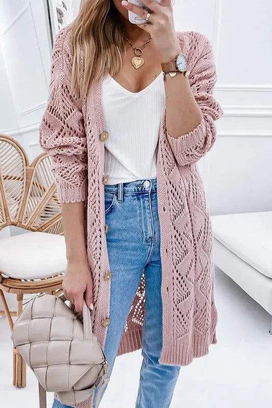 Eyelet sweater cardigan layered over outfit in pink
