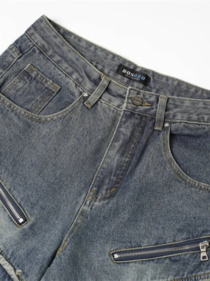 Close-up of Men’s Wide Leg Jeans with Frayed Seam details denim pockets with zipper.