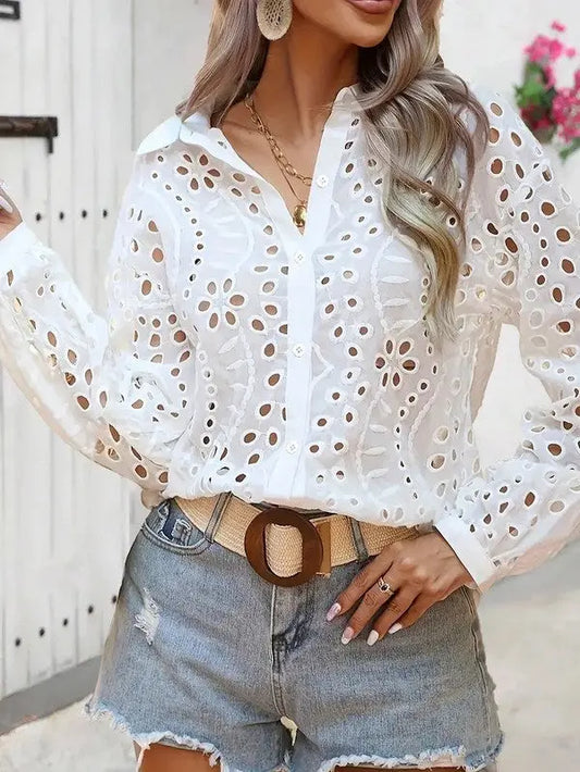 Floral long sleeve eyelet top for women in white on female model.