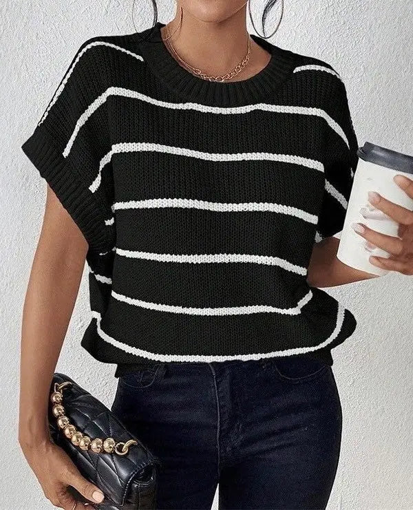 Striped sleeveless sweater for women featuring a lightweight knit design and relaxed fit - black with white stripes on model.
