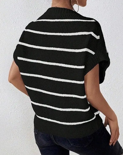 Striped sleeveless sweater for women featuring a lightweight knit design and relaxed fit - black with white stripes on model. Back view.
