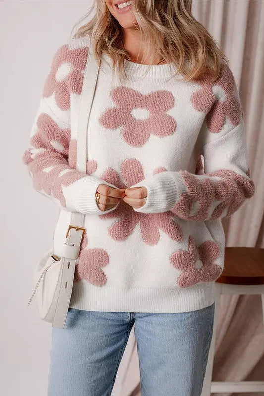 Vintage flower drop shoulder loose sweater for women featuring a relaxed fit and soft knit fabric on female model posing with purse.