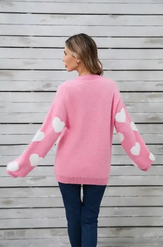Cozy heart patterned fuzzy sweater back view - on female model.