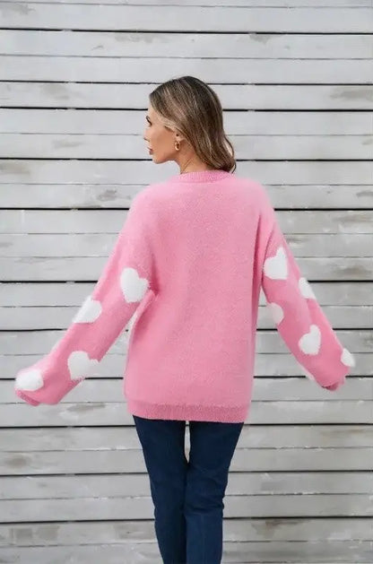 Cozy heart patterned fuzzy sweater back view - on female model.