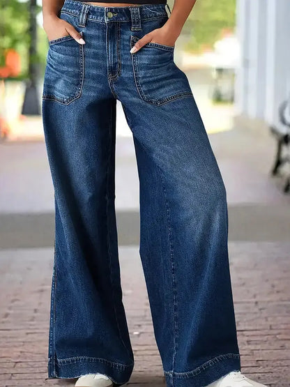 High rise wide leg jeans in deep blue wash displayed front view.