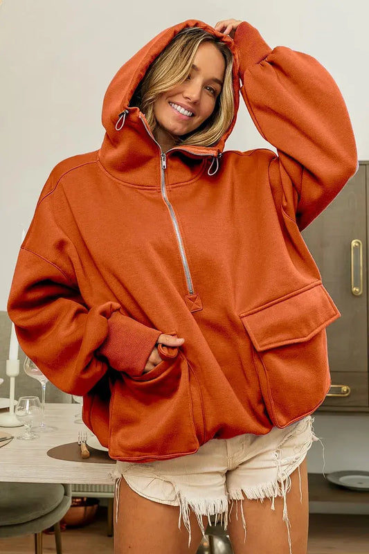 Front view of BiBi half zip vintage washed fleece hoodie in oversized fit.