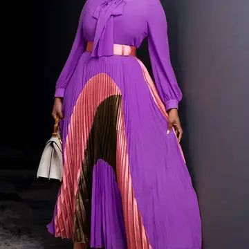 Side view of pleated purple midi dress