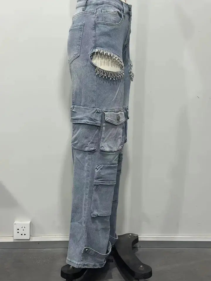 Side view of Distressed Wash Cargo Jeans Couture Envy on display