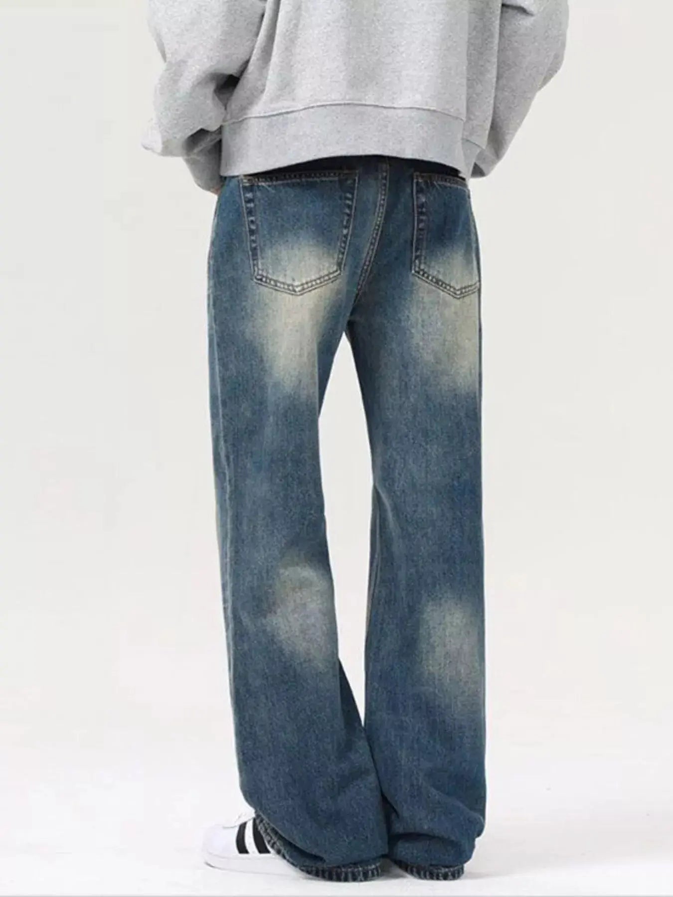 Men’s Vintage Wash Loose Fit Jeans back view.