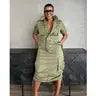 Green utility pocket shirt dress with adjustable waist – front view.