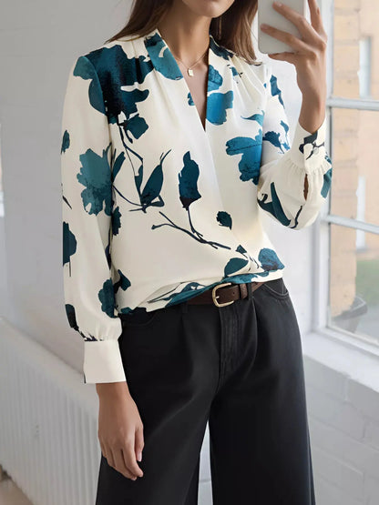 Woman wearing printed V-neck long sleeve blouse front view