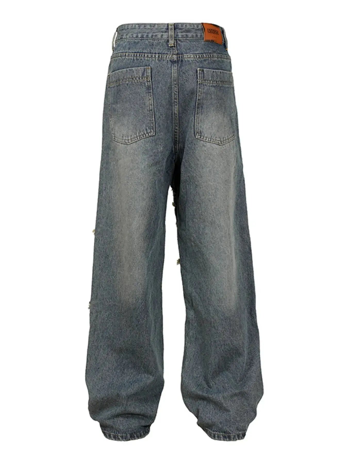 Back view of men’s oversized wide-leg jeans showing wash and pockets.