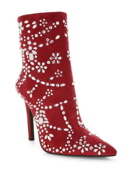 Front view of red diamante embellished stiletto boots with pointed toe.
