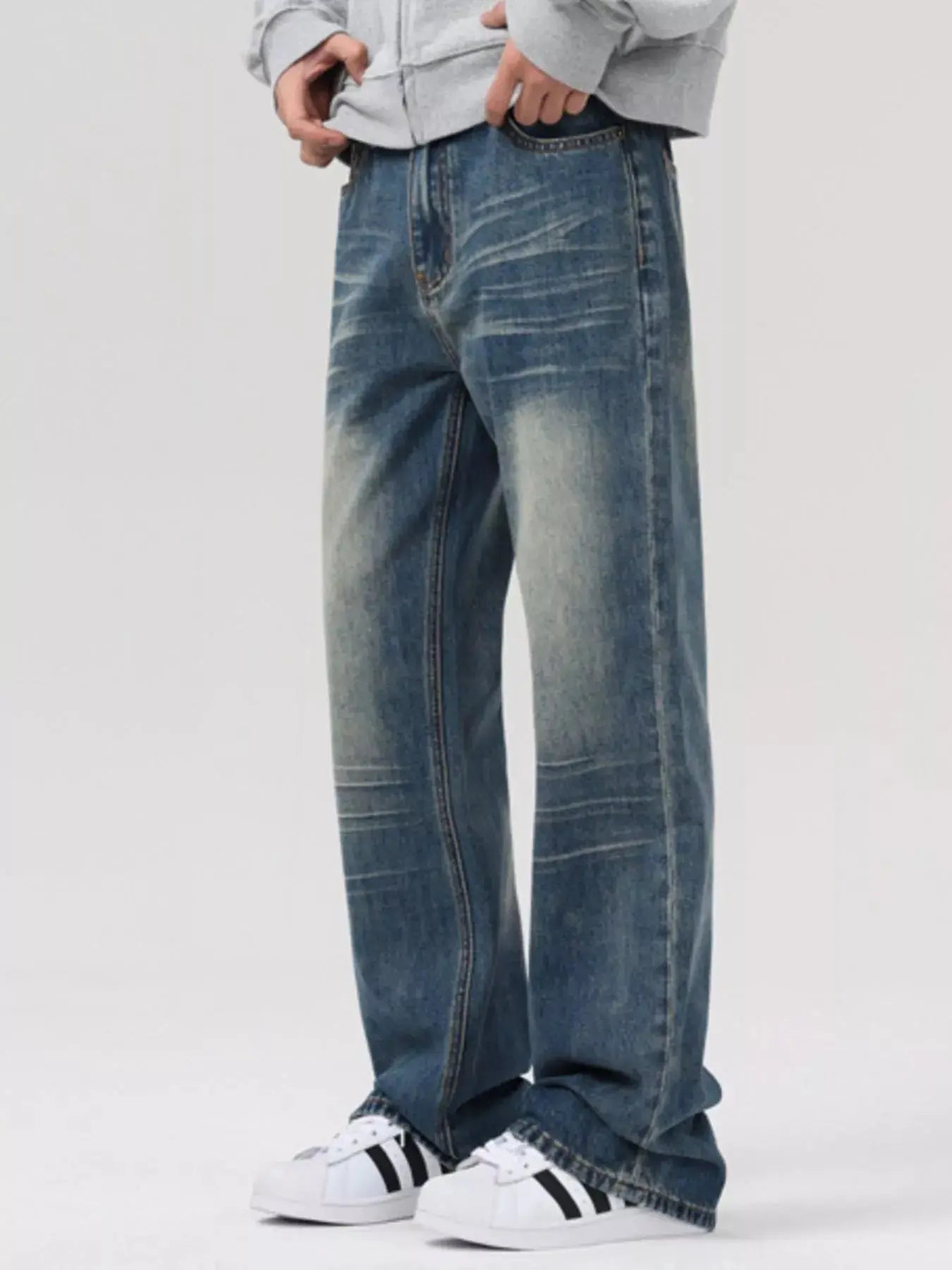 Men’s Vintage Wash Loose Fit Jeans side view.