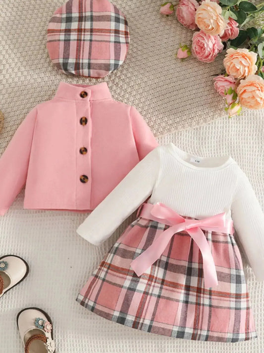 Front view of children’s plaid 3-piece outfit set with long-sleeve top, skirt, and matching beret in pink tones.