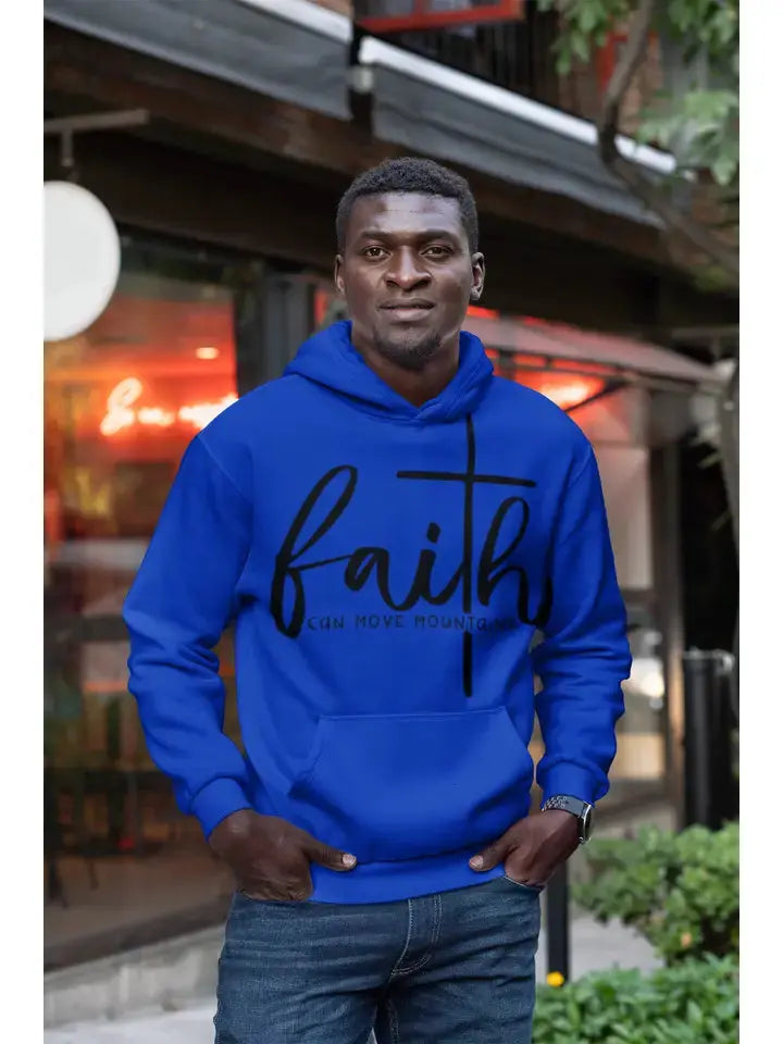 Blue faith hoodie modeled in casual outdoor background.