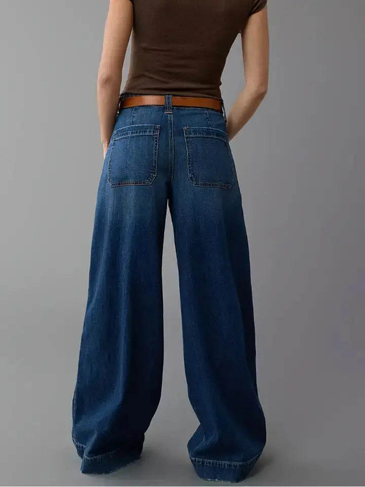 Back view of wide leg denim jeans with relaxed silhouette.