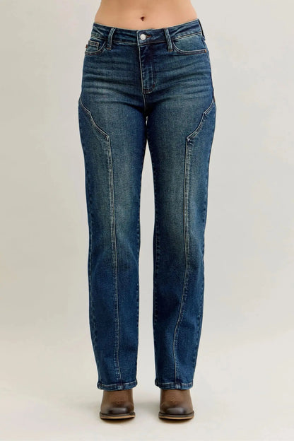 Plus size model wearing Judy Blue straight leg jeans front view.