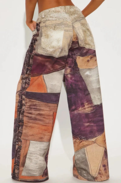 Back view of abstract wide-leg pants with elastic high waist.