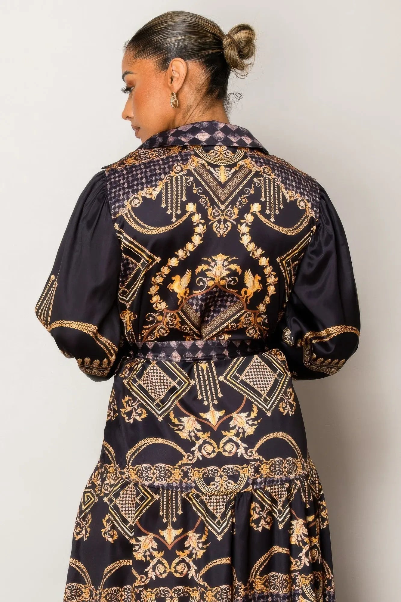 Back view of lightweight maxi dress with relaxed silhouette.