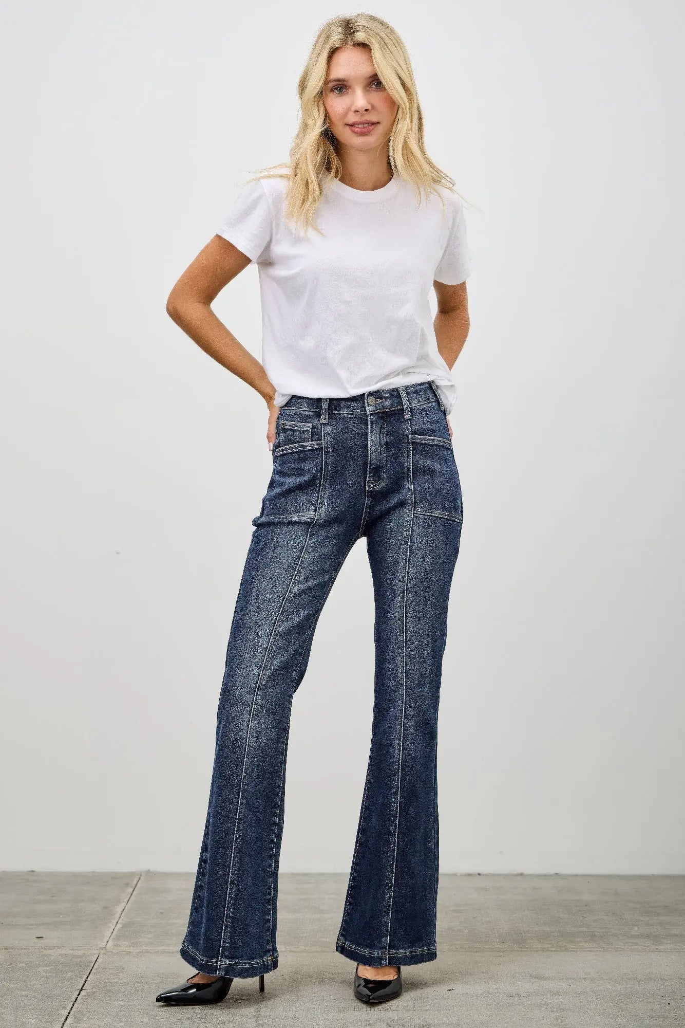High rise denim with tailored seam detail on female model 
