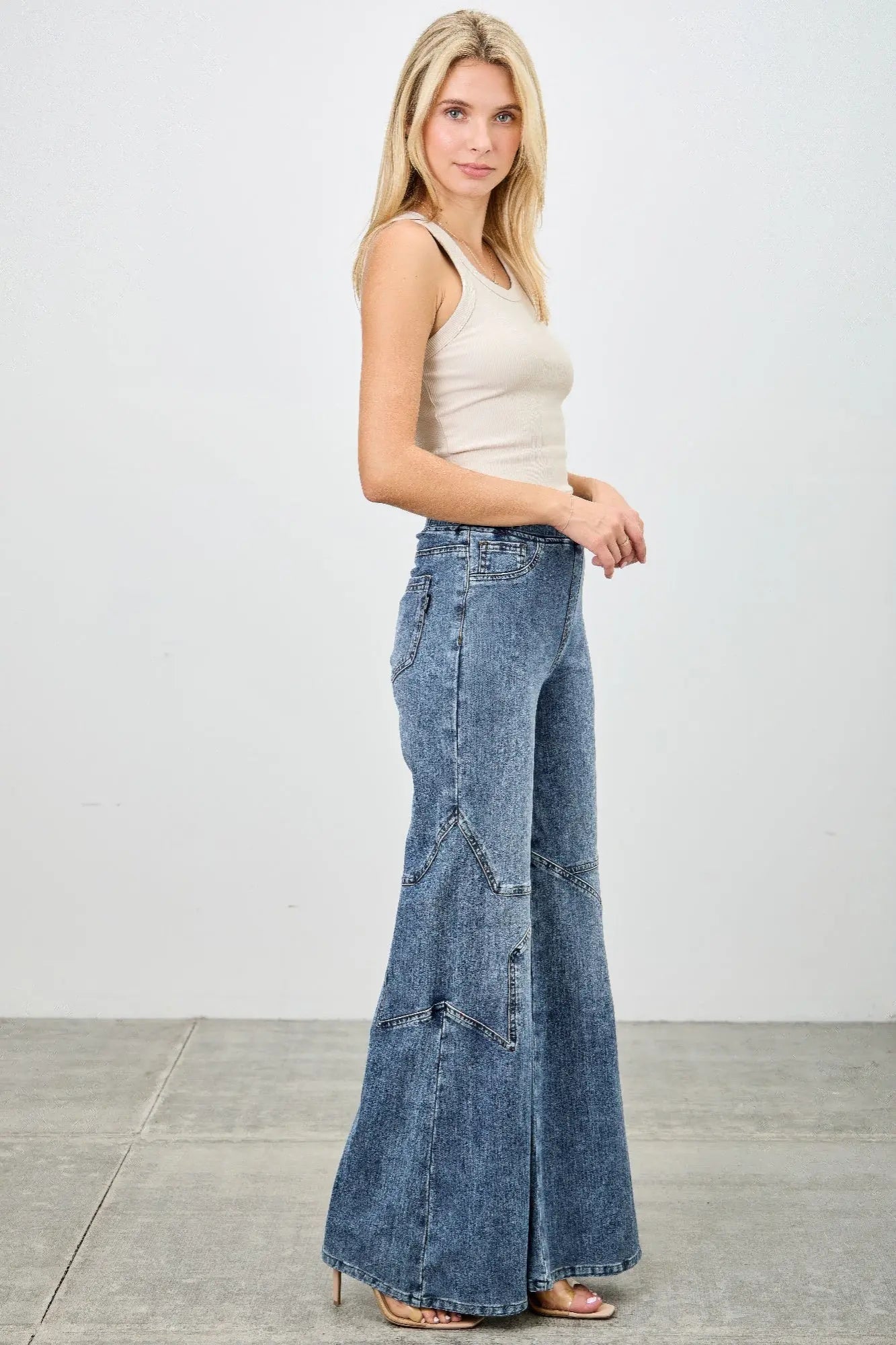 Plus size star detail wide leg knit denim jeans side view