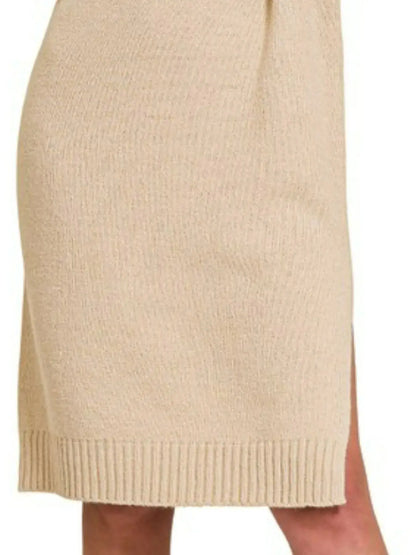Close-up of ribbed knit texture on beige turtleneck midi sweater dress with side split.