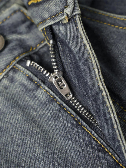 Close-up of Men’s Wide Leg Jeans with Frayed Seam details of denim  zipper closure.