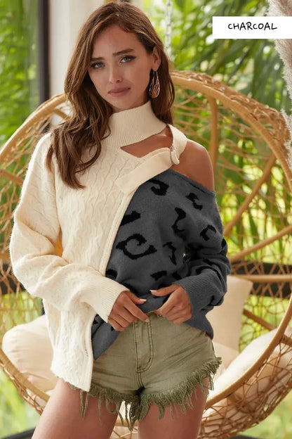 Model wearing cream cable-knit one-shoulder asymmetrical sweater