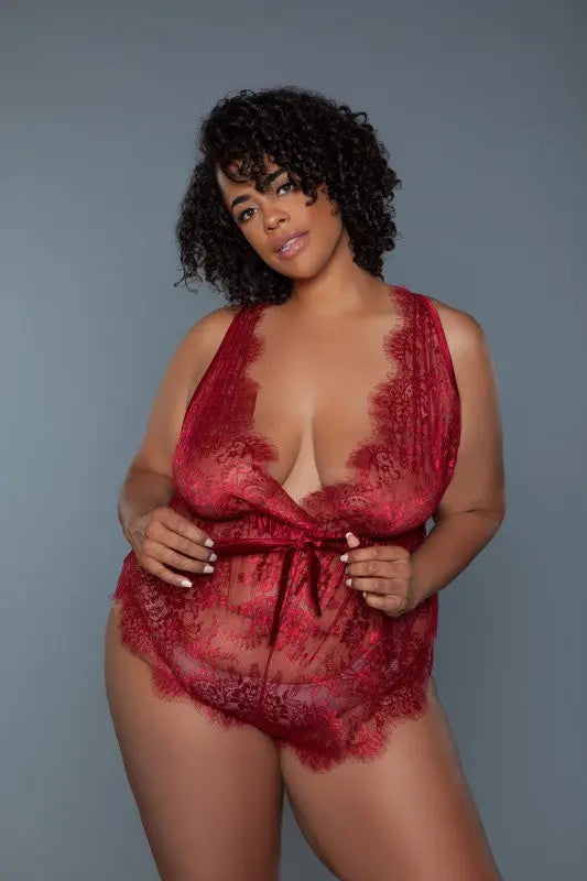 Plus size lace teddy lingerie in rust on female model