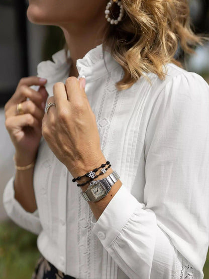 Women’s lace trim long sleeve shirt in elegant white - collar close up