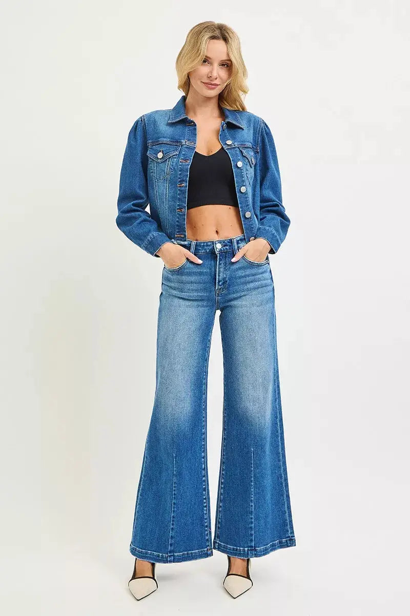 Full-length model view wearing RISEN wide leg flared jeans