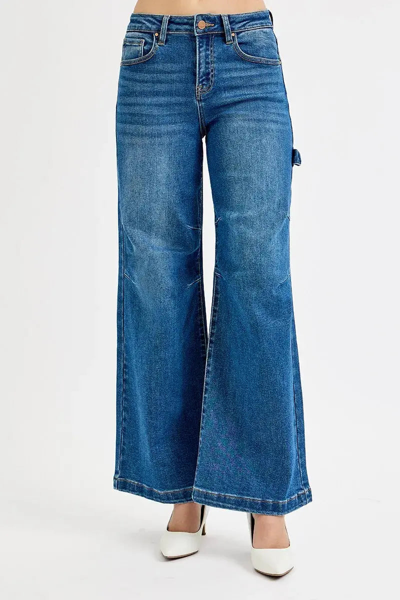 Wide-leg silhouette of high-rise patch detailed denim jeans.