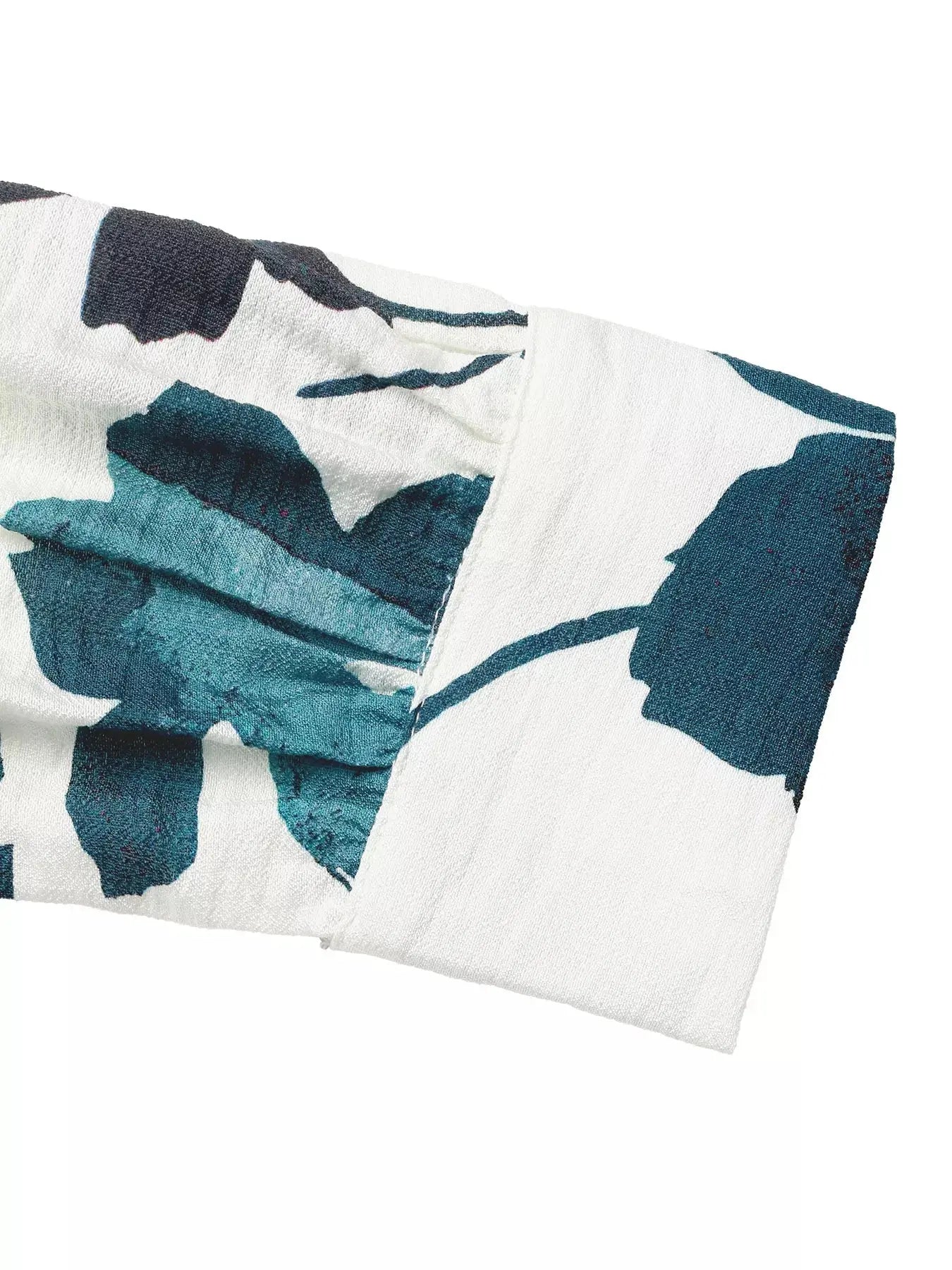 Close-up of printed fabric pattern of sleeve