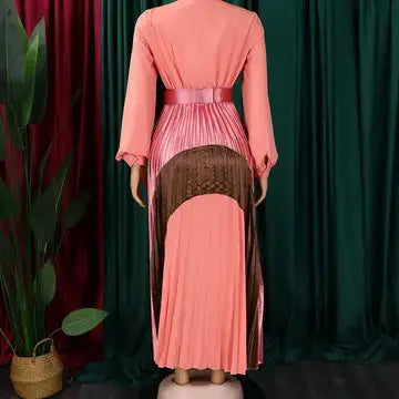 Back view of pink pleated long-sleeve midi dress