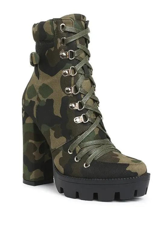 Front view of women’s camo print ankle boots with platform sole.