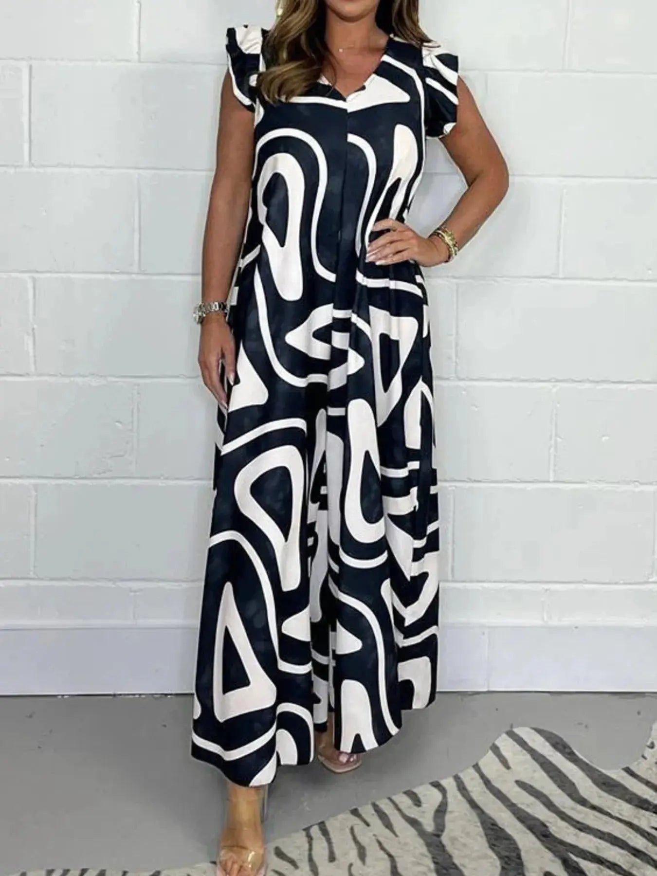 Full Size Printed Wide - Leg Jumpsuit with Flutter Sleeves Plus Size - Couture Envy