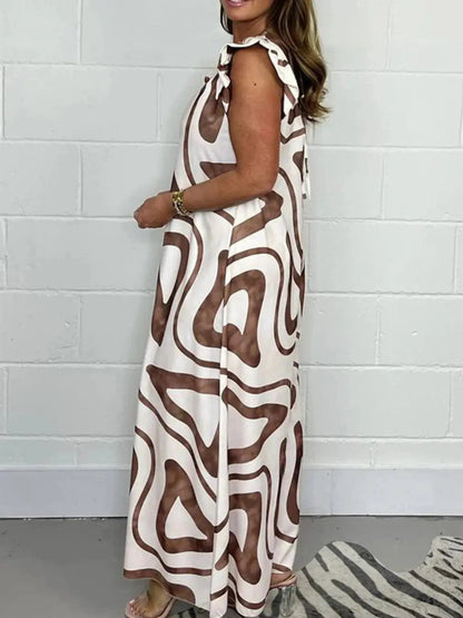 Full Size Printed Wide - Leg Jumpsuit with Flutter Sleeves Plus Size - Couture Envy